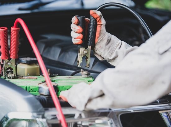 car-repairman-wearing-white-uniform-standing-holding-wrench-that-is-essential-tool-mechanic_1150-16588