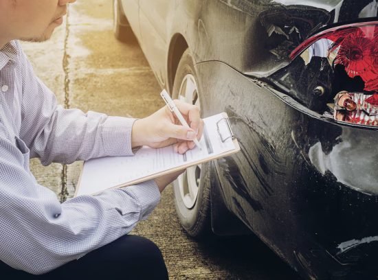 insurance-agent-working-car-accident-claim-process_1150-6413
